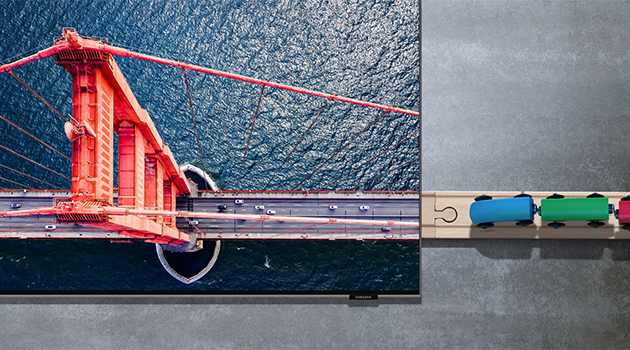 QLED leverer enestående billedkvalitet, uanset hvad du ser QLED-TV med Brio-tog, som glider sømløst ind i billedet fra højre