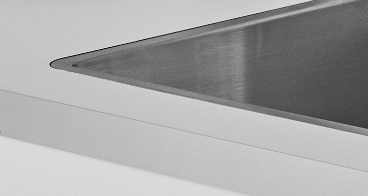 Underlimet vask En underlimet vask i bordplade af laminat
