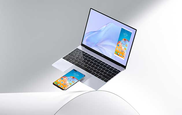 Gør din mobil og Huawei MateBook X til en superenhed Mobiltelefon ligger på Huawei MateBook X