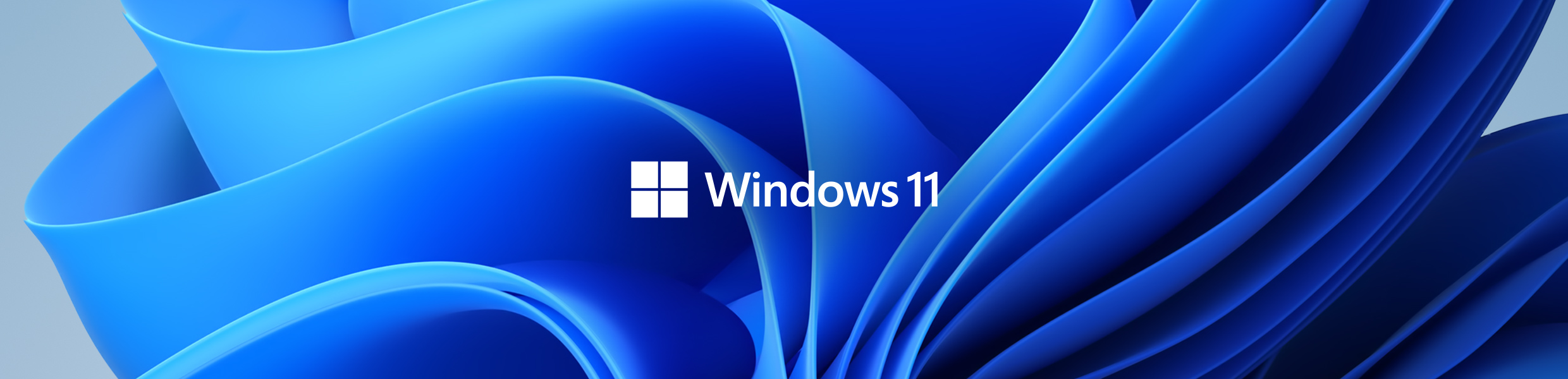 Windows 11 Windows 11-text i hvit på en blå baggrund