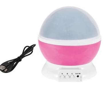 Lyserød natlampe med roterende stjernehimmel