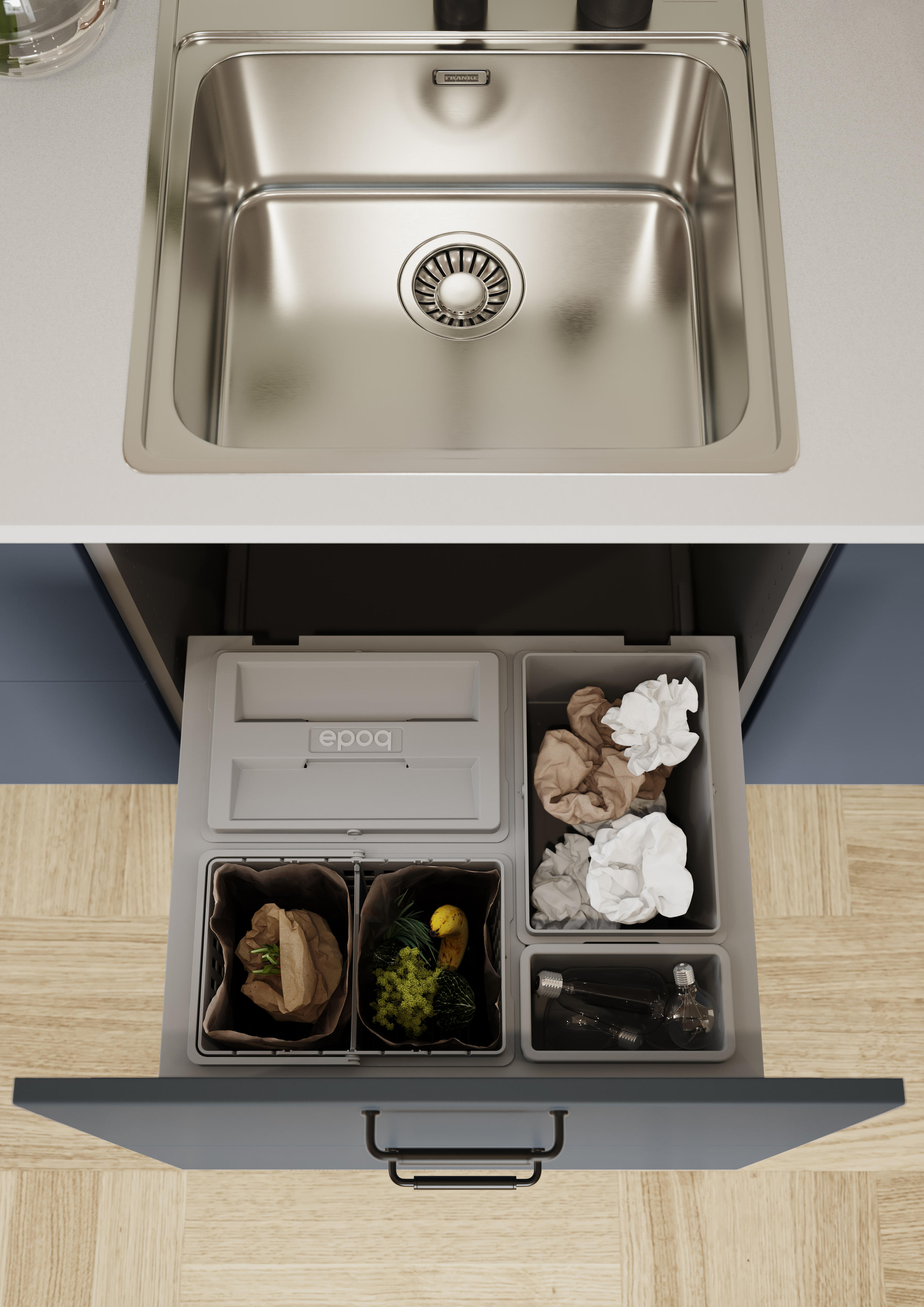 Blåt EPOQ Trend-køkken monteret med skuffe med affaldssorteringssystem under håndvask