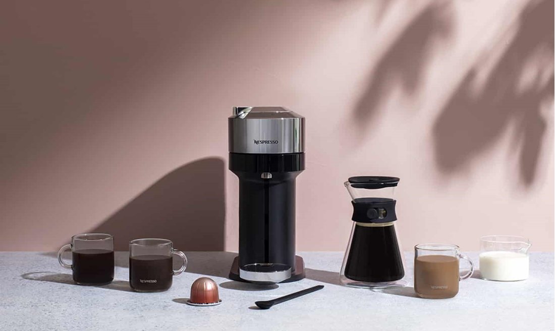 Nespresso coffee machine, coffee cups and coffee carafe