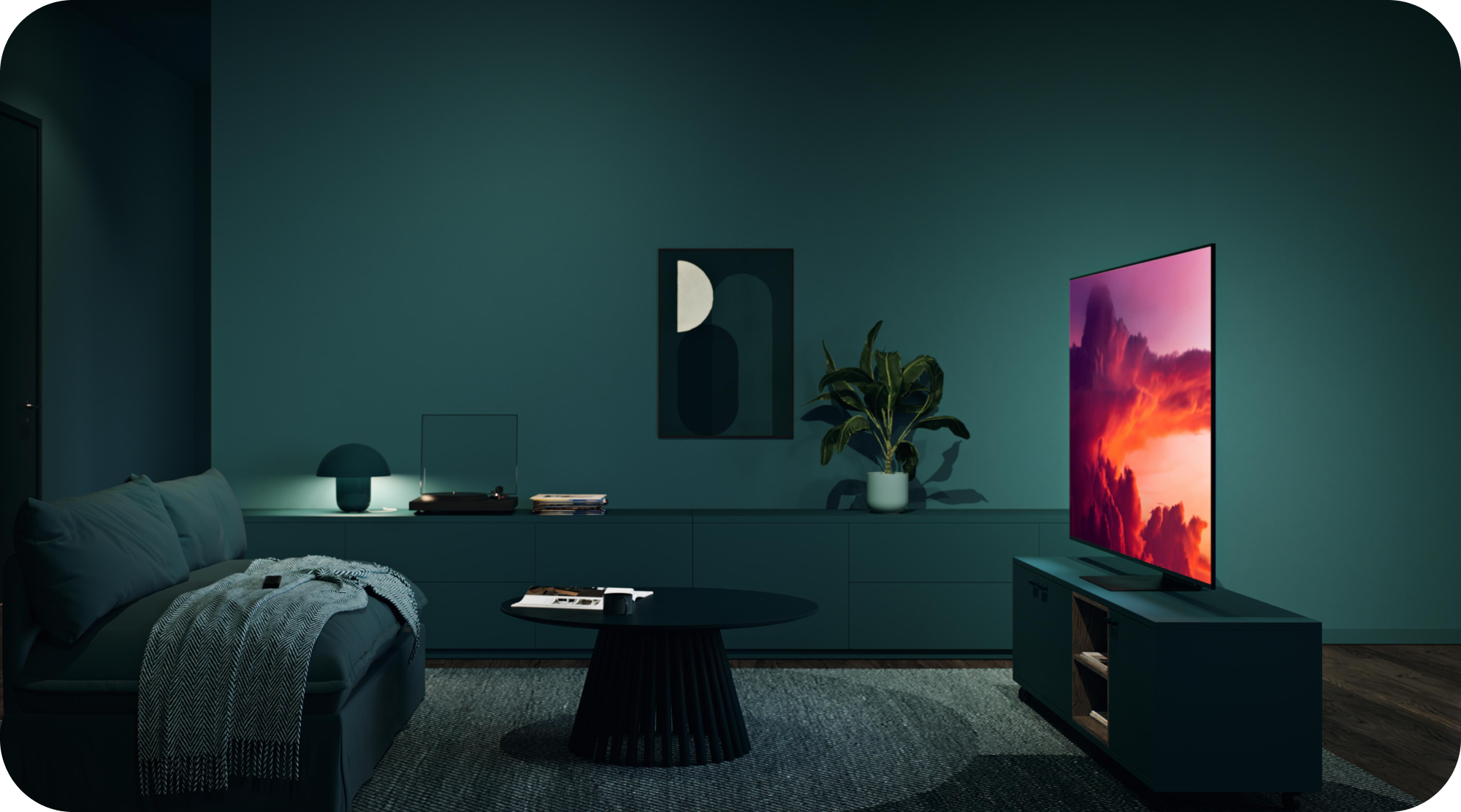 Samsung OLED TV i en mørk stue med et lyst billede på skærmen