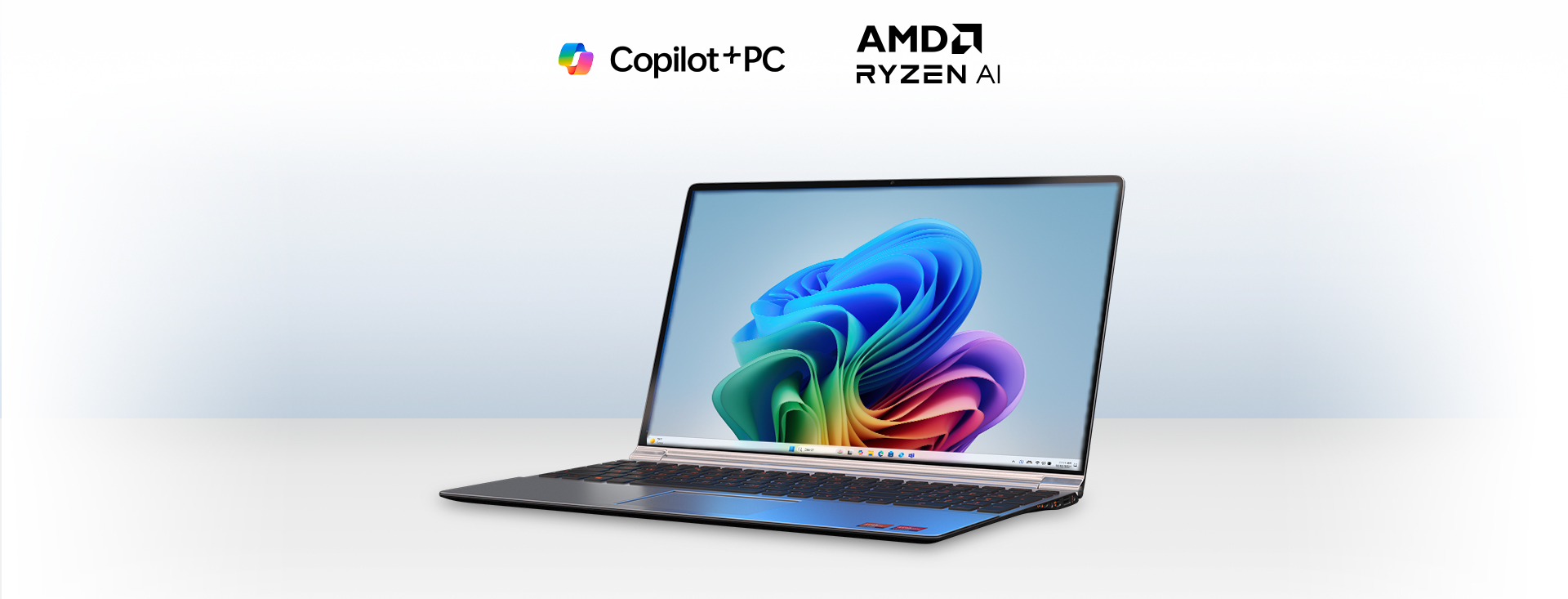Bærbar computer og teksten "CoPilot + PC, AMD RYZEN AI"