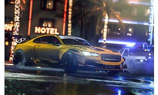 Need for Speed HEAT - en gul bil, der kører på en gade om natten