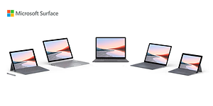 Fem forskellige Surface-computere på hvid baggrund