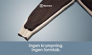 En brun sweater på blå baggrund