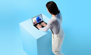 Woman working on a Windows 11 laptop