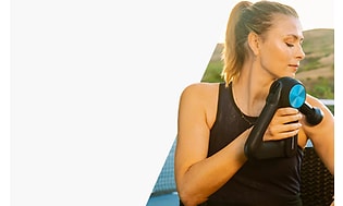 Maria Sharapova med en Theragun massagepistol