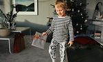 Boy holding Christmas gift