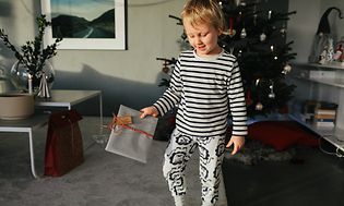 Boy holding Christmas gift