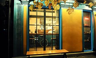 Cafe pictured from outside through the window