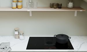 Lysegrønt EPOQ Trend-køkken med hvid marmor bordplade, kogeplade med indbygget emhætte