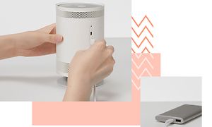 Samsung-Freestyle-Projektor og et Samsung batteri