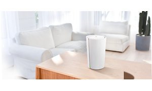 TP-Link - Hvid Deco X90 på et træbord