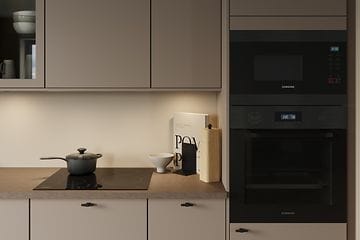 Epoq kicthen in sand with two black integrated ovens