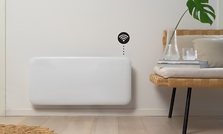 Smart radiator på væg med wifi symbol