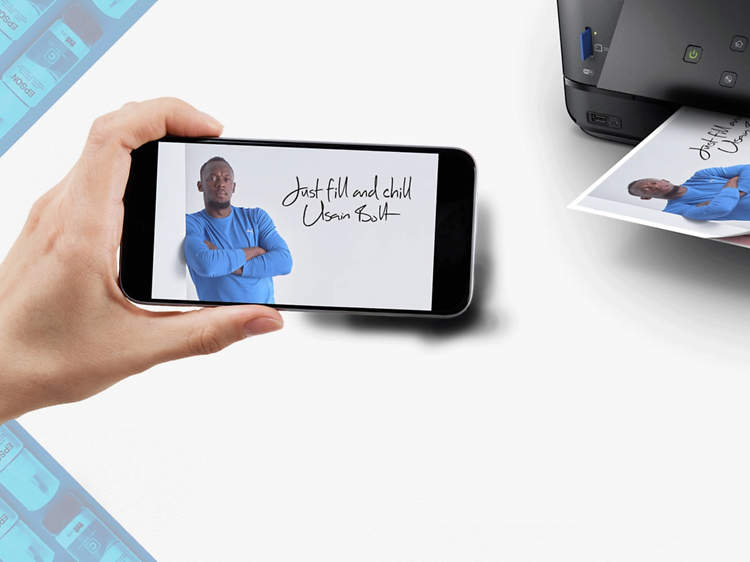 Udskrivning - Mobiltelefon med tekst fra Usain Bolt