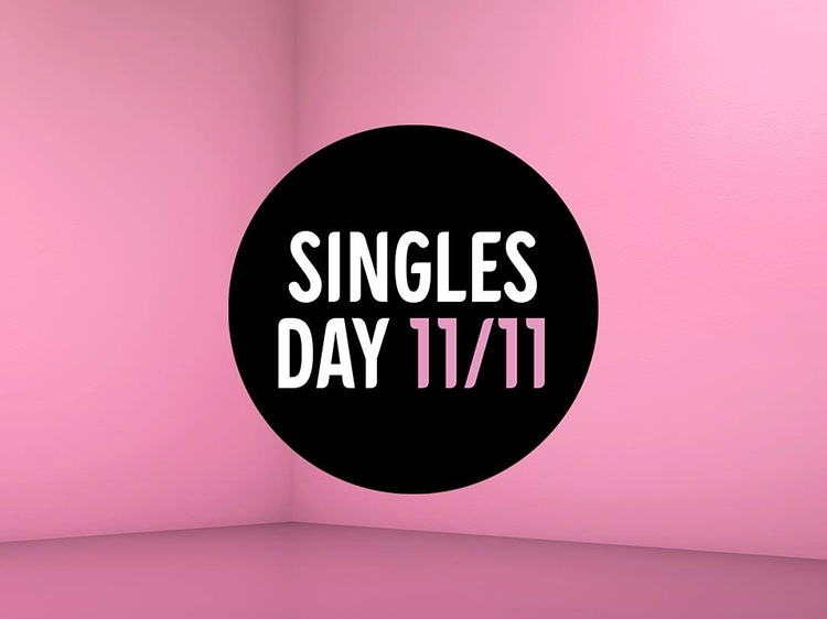 Sort cirkel med teksten Singles Day på lyserød baggrund