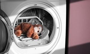 MDA-Tumble dryer-Plush toy place in a dryer racket in an open tumble dryer