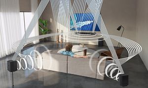Samsung-TV på væg i en stue med lydbølger