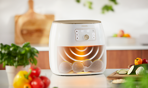 Hvid Philips Airfryer XXL og illustration, der viser dens teknologi