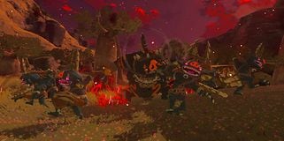 Screenshot af spillet med monstre der løber mod skærmen