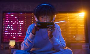 Young boy gaming with the Xperia 1 V