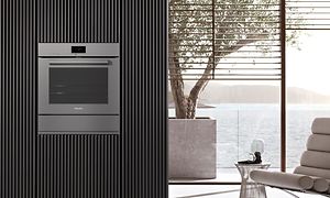 Integreret Miele ovn i åben køkkenløsning