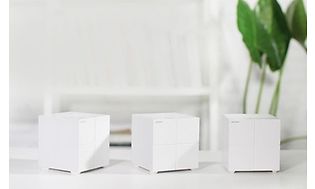 3 små routere i et mesh setup