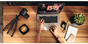 Person editing vlog on mac